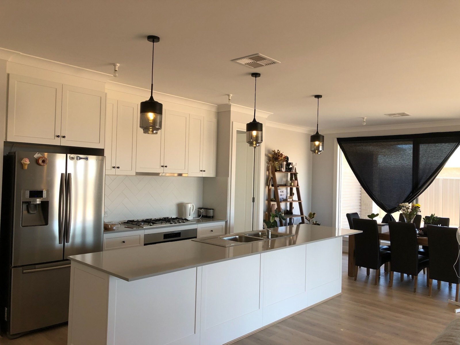 Kitchen pendant lighting installation completed by Active Electrical & Maintenance